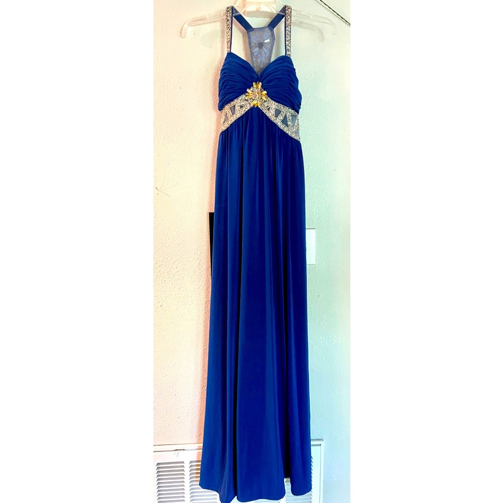 Floor length prom dress with sheer cutouts